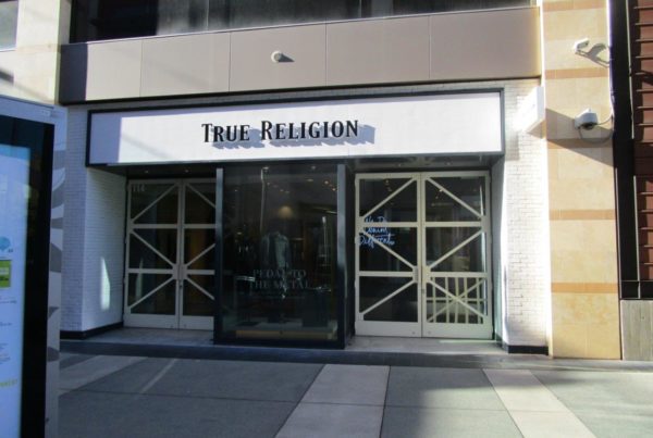 Example of specialty sign installation by NGS Films and Graphics at True Religion.