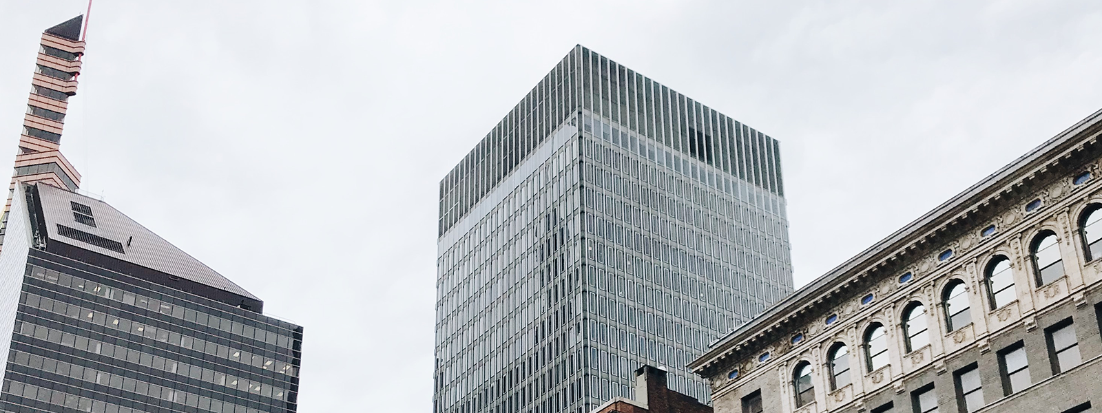 Maryland skyline of buildings with window film, graphics, and signage