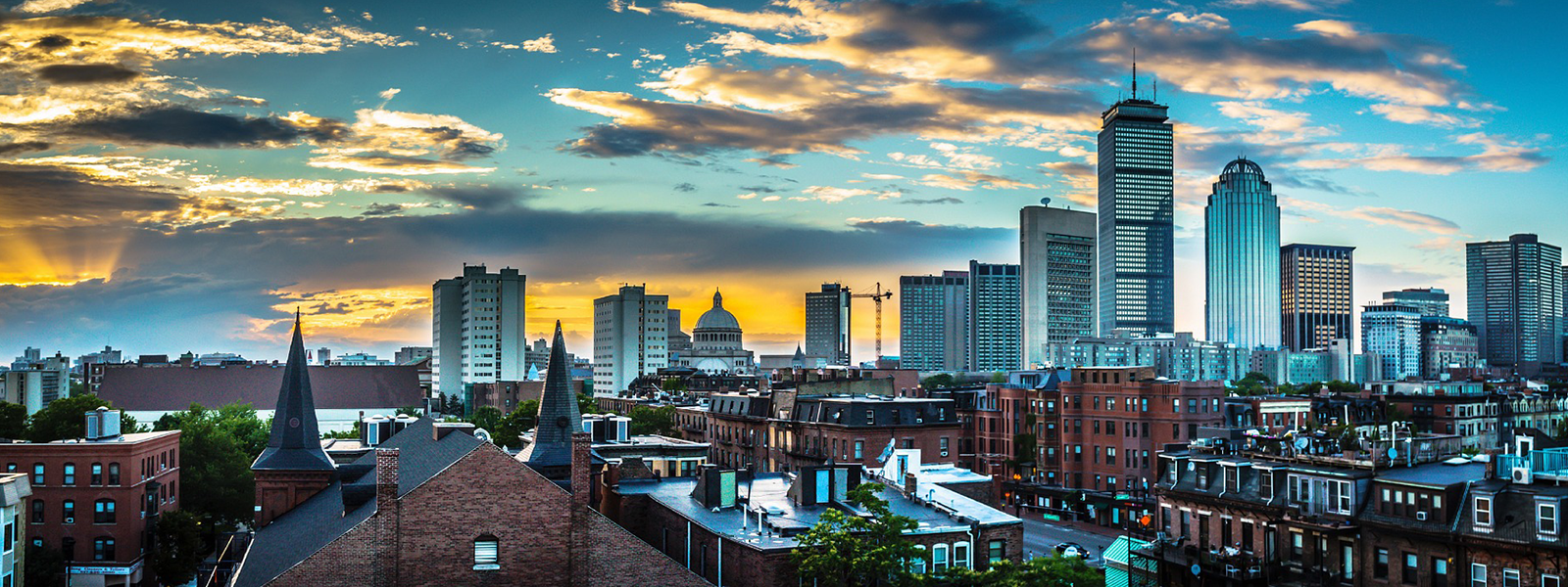 Boston skyline of buildings with window film, graphics, and signage