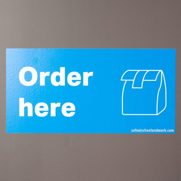 Order Here graphic on wall