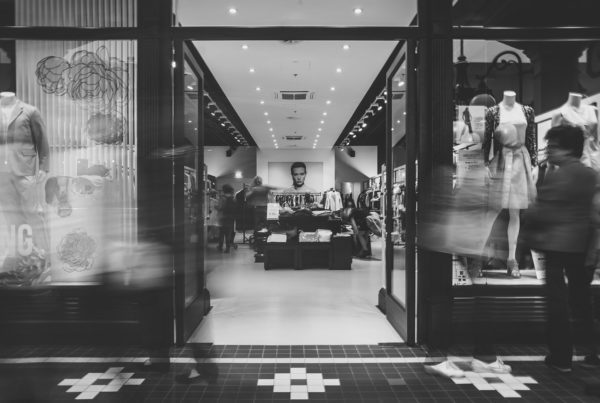 An outside perspective looking into a retail shop at an indoor mall.