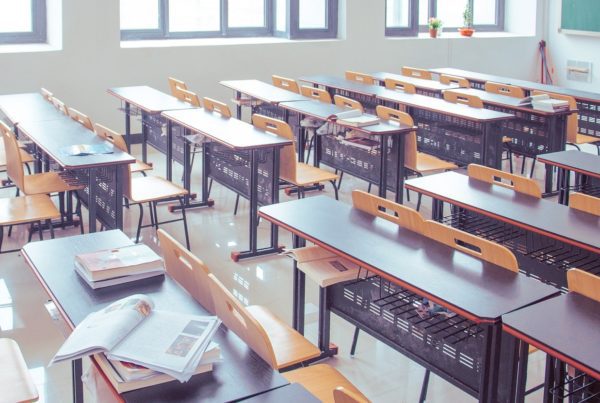 A classroom with windows that can be helped by the energy efficiency grant