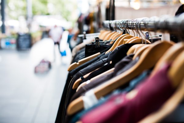 Rack of clothing in a retail store demonstrating the importance of retail security