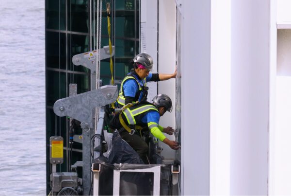 NGS window film installers installing Solar Window Film on a 34 story building in New York (Wall Street Plaza)